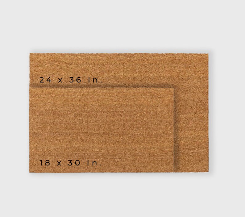 May include: Two brown coir doormats, one smaller than the other. The larger mat measures 24 x 36 inches, and the smaller mat measures 18 x 30 inches.