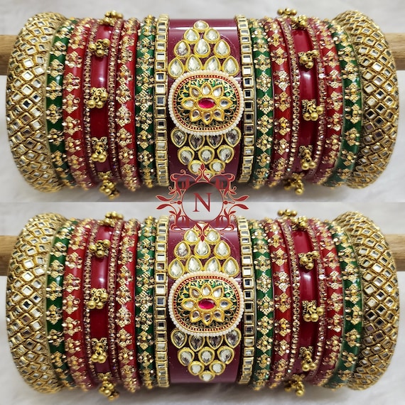 Heavy marwari rajputi chura. Indian wedding bridal chura in red and green colour with kundan work. Fusion of both Punjabi and rajputi look