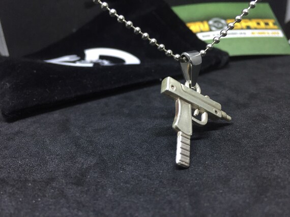 collier homme uzi collier homme uzi