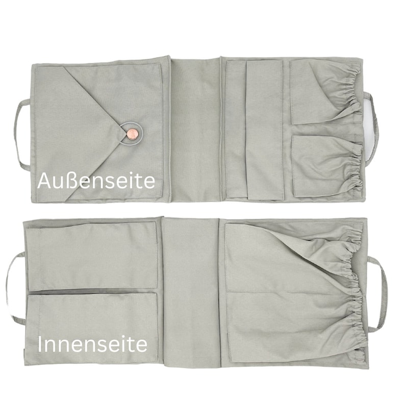 May include: A gray fabric organizer with multiple pockets and a drawstring closure. The organizer is shown open, revealing the inside pockets. The text "Au&szlig;en seite" is printed on the outside of the organizer and "Innen seite" is printed on the inside.