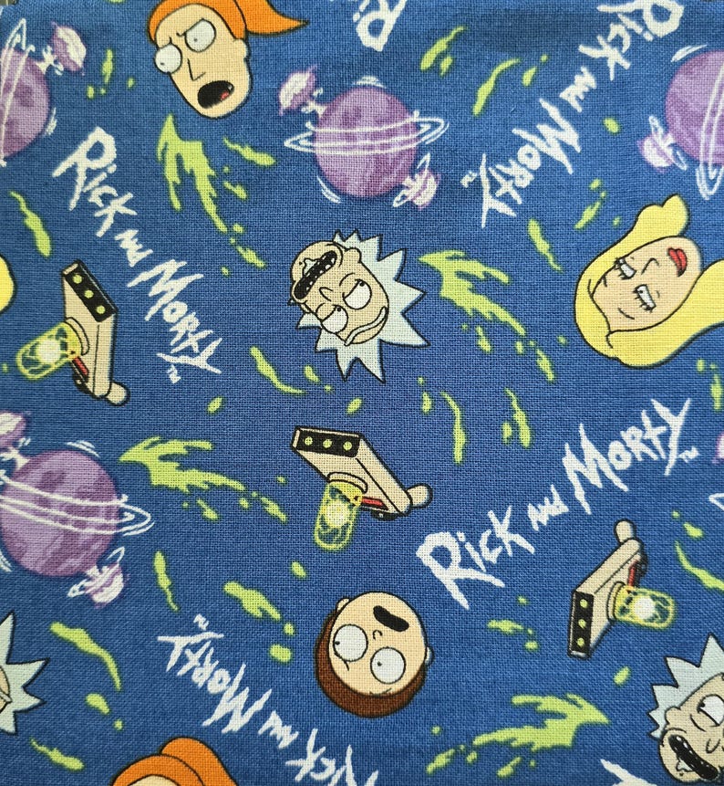 May include: A blue fabric featuring a repeating pattern of Rick and Morty characters, purple planets with rings, portal guns, and green portal energy streaks. The text Rick and Morty is printed in white throughout the fabric design.