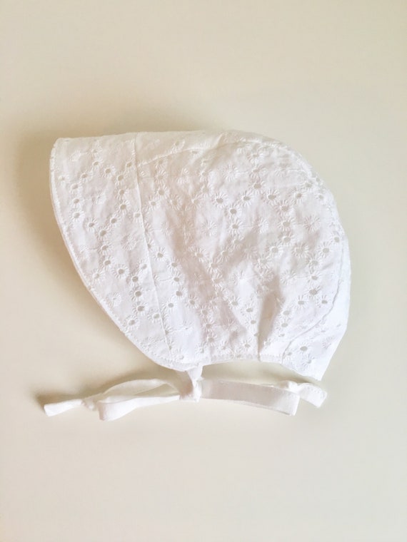 white eyelet baby bonnet