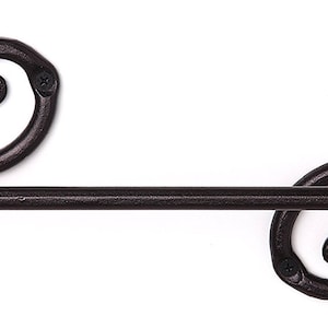 May include: Black wrought iron towel rack with two decorative scroll ends.