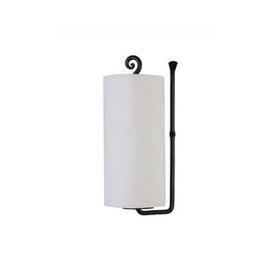 May include: Black metal paper towel holder with a decorative scroll design. The holder is mounted to a wall and has a paper towel roll attached.