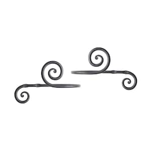 May include: Two black metal curtain holdbacks with a decorative swirl design. Each holdback has three small decorative accents.
