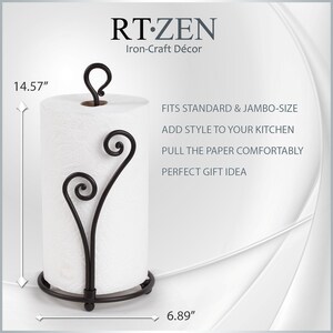 May include: Black metal paper towel holder with a decorative scroll design. It is 14.57 inches tall and 6.89 inches wide.  RT-ZEN Iron-Craft D&eacute;cor.