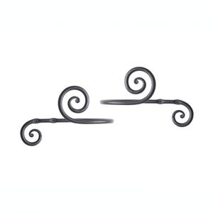 May include: Two black metal curtain holdbacks with a decorative scroll design. Each holdback has a small round knob on the side.