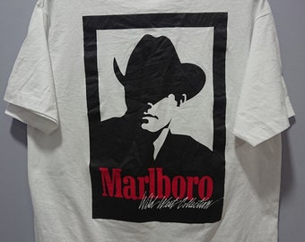 ASAP Rocky Smokes in a Vintage Marlboro T Shirt and Vans ASAP Rocky Smokes in a Vintage Marlboro T Shirt and Vans