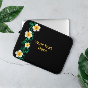 May include: Black laptop sleeve with a floral design. The sleeve features a pattern of white and yellow flowers with green vines along the left side. The text "Your Text Here" is in yellow on the right side of the sleeve.