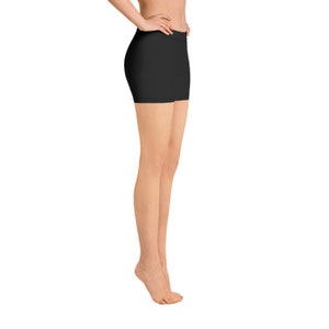 May include: Black athletic shorts with a high waist and a fitted silhouette. The shorts are made of a stretchy, comfortable fabric.
