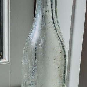 Light Green Clear Glass Bottle