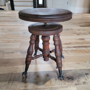 Antique The Chas Parker Wooden Adjustable Piano Stool with Cast Iron Claw Feet and Glass Balls