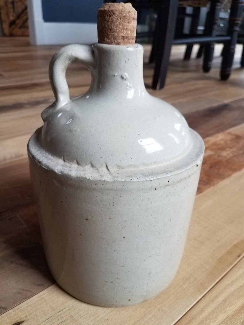 1 2 gallon jug with straw
