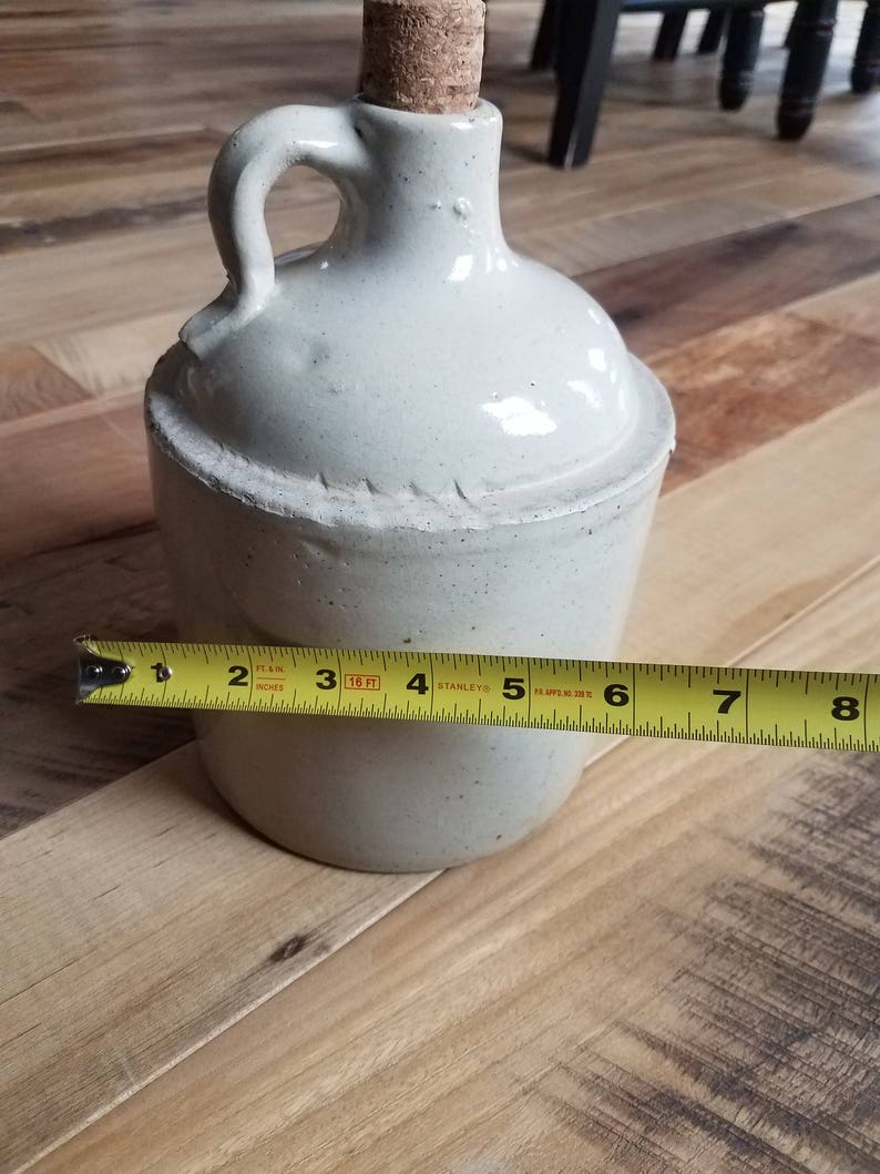 1 2 gallon jug with straw