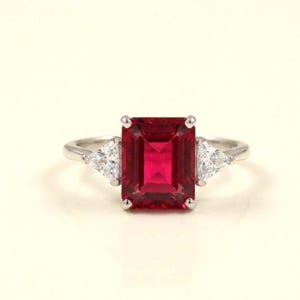 Emerald Cut Ruby Ring with Trillion Side Stones | 14K Gold Plated Sterling Silver | Simulated July Birthstone Ring | 3-Stone Engagement Ring