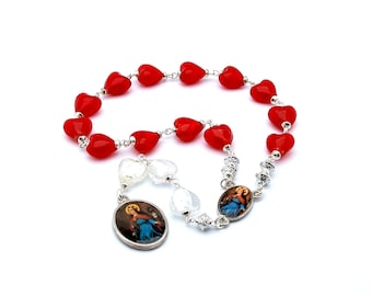 Saint Philomena prayer chaplet with red and white glass heart beads and picture medals.