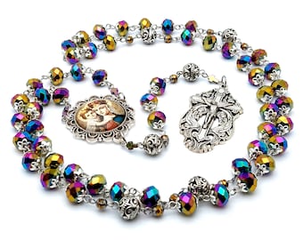 Our Lady Helper of Christians multi coloured faceted glass rosary beads with holy angel crucifix and silver Our Father beads.