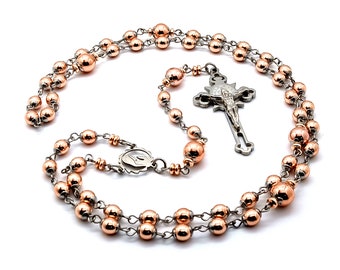 Virgin Mary rose gold hematite gemstone rosary bead with engraved stainless steel crucifix.