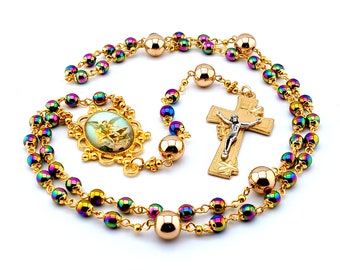 Saint Michael hematite gemstone rosary beads with gold plated lily crucifix and rose gold Our father beads.