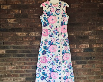 Beautiful 1960s Floor-Length Dress• Ivory Gown with Colorful Abstract Floral Print• Sleeveless• Well Made Vintage• Vertical Floral Trim