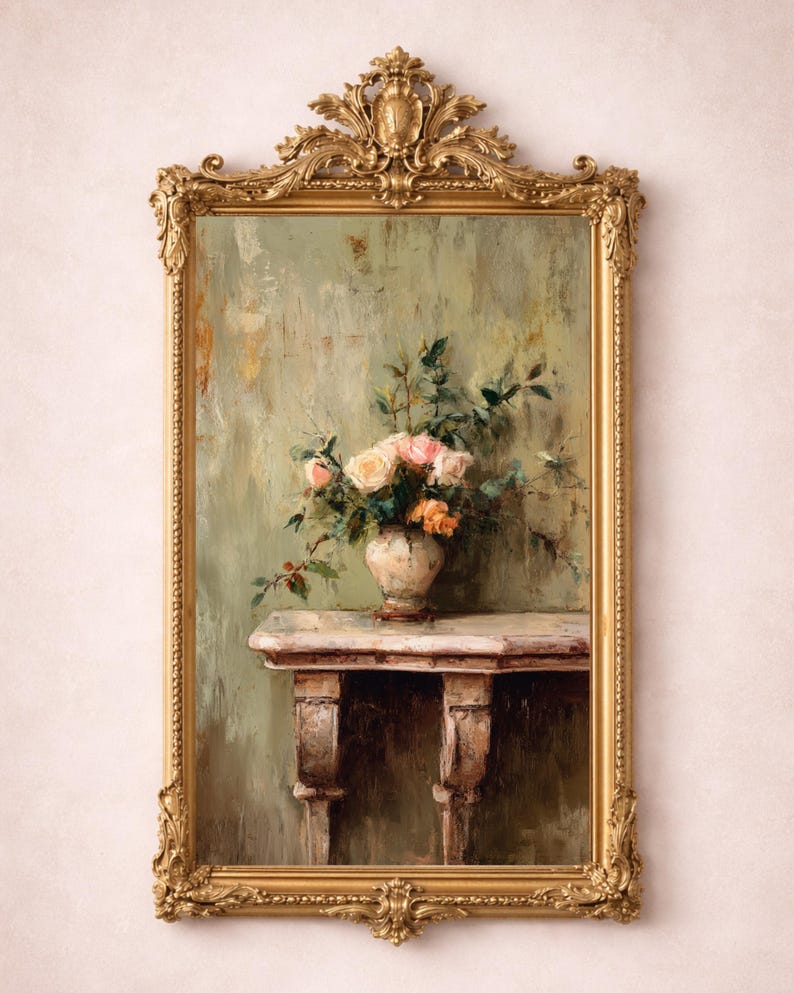 May include: A framed painting featuring a still life of flowers in a vase on a table. The painting has a gold ornate frame. The flowers are pink and orange, and the background is a muted green.
