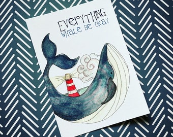 May include: A white card with blue and white chevron pattern background. The card has a blue whale illustration with a red and white lighthouse on its back. The text on the card reads "Everything whale be okay."
