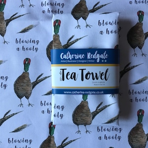 Blowing a Hooly PHEASANT illustrated TEA TOWEL 100% cotton with hanging loop Catherine Redgate kitchenware homeware gift wind scottish windy