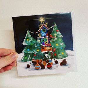 CAROLLING ROBINS Carte illustrée vierge Catherine Redgate humour amusant lunatique original mignonnes cartes de fête de Noël maison d'oiseau neige arbres robin