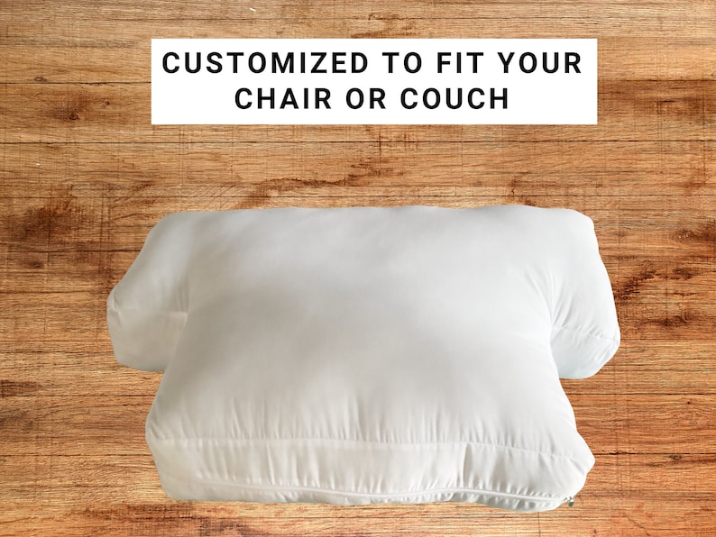 May include: White pillow with a zipper closure. The pillow is designed to fit a chair or couch. The text "CUSTOMIZED TO FIT YOUR CHAIR OR COUCH" is printed on a white rectangle above the pillow.