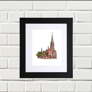 May include: A framed black and white illustration of a red brick church with a tall green steeple.
