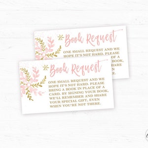 May include: Two pink and gold book request cards with a floral design. The text on the cards reads "Book Request" and "One small request and we hope it's not hard. Please bring a book in place of a card. By signing your book, we'll remember and share your special gift, even when you're not there."