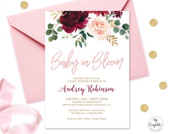 May include: A pink and white baby shower invitation with a floral design. The text reads "Baby in Bloom" and includes the details of the event: "Please join us for a baby shower in honor of Audrey Robinson, 4:30 PM | SAT | SEPT 15TH, ROBINSON RESIDENCE, 8993 PEACH TREE ROAD | SONOMA, CA, KINDLY RSVP BY AUGUST 20 TO MEGAN at 900.888.0000, Registry: Hello Baby & Baby Shoppe".