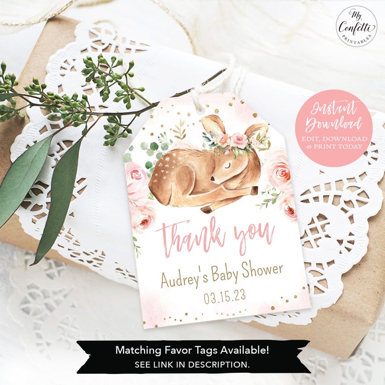 May include: Pink and gold thank you tag with a watercolour illustration of a fawn wearing a floral crown. The tag says "Thank you" and "Audrey's Baby Shower 03.15.23".