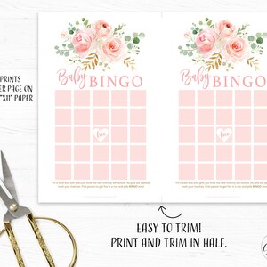 May include: Two pink and white baby shower bingo cards with floral illustrations and gold accents. The cards are printed on 8.5" x 11" paper and can be trimmed in half.