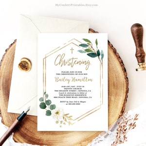 May include: A white card with gold geometric frame and green and white floral accents. The text reads "Christening" and includes the name "Bailey Hamilton" and details for a christening ceremony at Trinity Church in Sonoma, California.