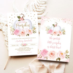 May include: A baby shower invitation with a white pumpkin with pink flowers and gold glitter. The text reads "A sweet little pumpkin is on her way!" and "Please join us for a baby shower in honor of Audrey Kendall".