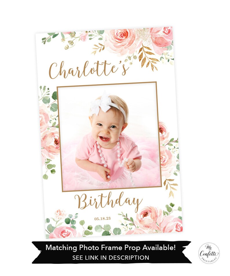 May include: A photo frame with the text "Charlotte's Birthday" and a photo of a baby girl. The frame is decorated with pink roses and green leaves. The date "05.18.23" is below the word "Birthday". The bottom of the frame has the text "Matching Photo Frame Prop Available! SEE LINK IN DESCRIPTION".