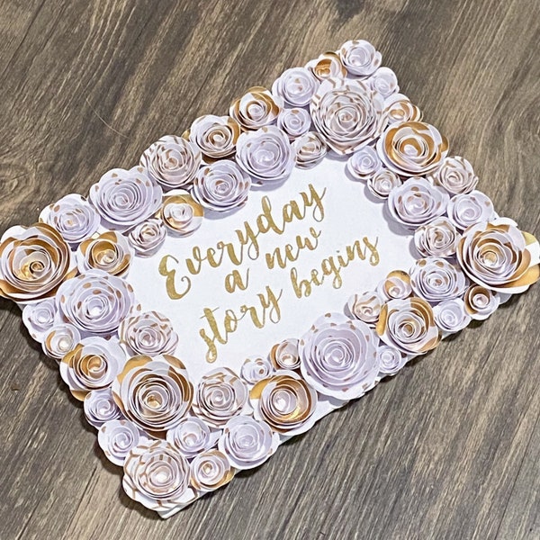 Gold Foil flower art, perfect for a wedding, with the message that “every day a new story begins” - gold and white flower art