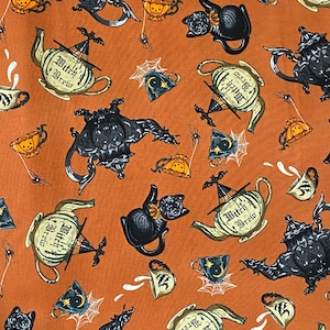 Rachel Hauer Halloween quilt fabric with vintage inspired spooky teapots and teacups along with black cats - cotton woven fabric by the yard
