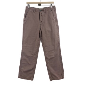 May include: A pair of brown cotton pants with a button fly and two front pockets.