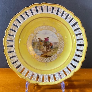 1774-1815 Meissen pierced plate. Yellow ground color with hand-painted pastoral scene.RARE