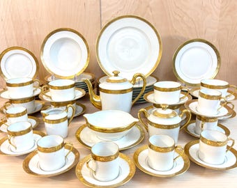 Service de table 69 pièces Raynaud Ceraline Limoges « Ambassadeur », porcelaine incrustée d'or, pour 8 personnes, état neuf.