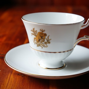 Royal Tuscan Aries pattern teacup and saucer, made in England. fine bone china