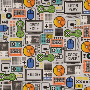 May include: A colorful, retro-style pattern featuring video game controllers, game consoles, and other gaming-related imagery. The pattern includes the text "Let's Play", "Game On", "Game Over", and "Win!" in a pixelated font.
