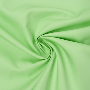 Cotton poplin clothing fabric lime green 1.4 m width