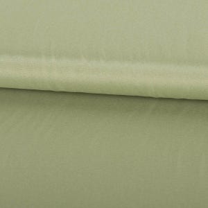 Könnte beinhalten: Nahaufnahme eines glatten, hellgrünen Stoffes. Der Stoff hat einen dezenten Glanz und eine leicht strukturierte Oberfläche.