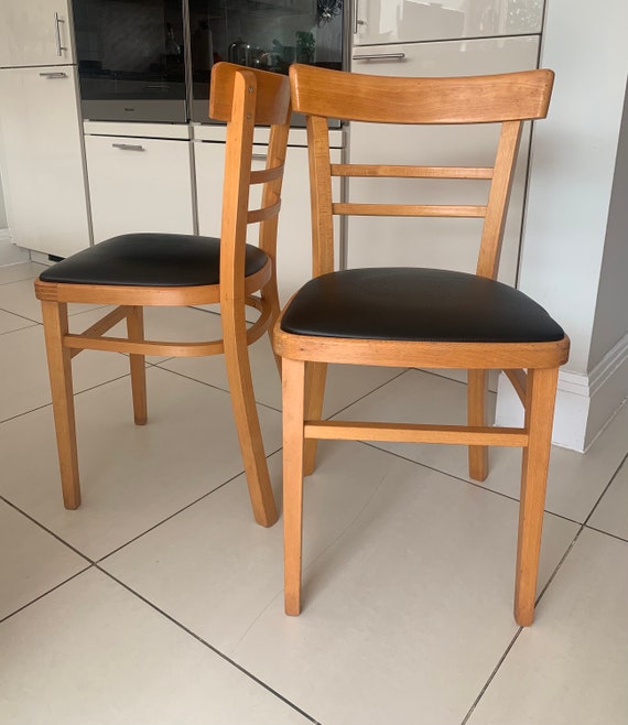 A Pair of Newly Upholstered Quitmann Style Retro Kitchen Dining Cafe Chairs in Black Leatherette