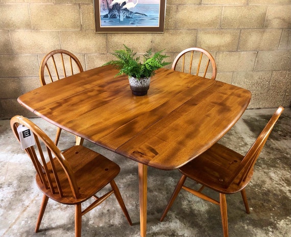 Drop Leaf Ercol Dining Table Model No 492 and Four Ercol Windsor Chairs Model No 400