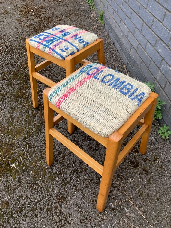 A Pair of Vintage Stacking Stools Newly Upholstered in Coffee Sacks