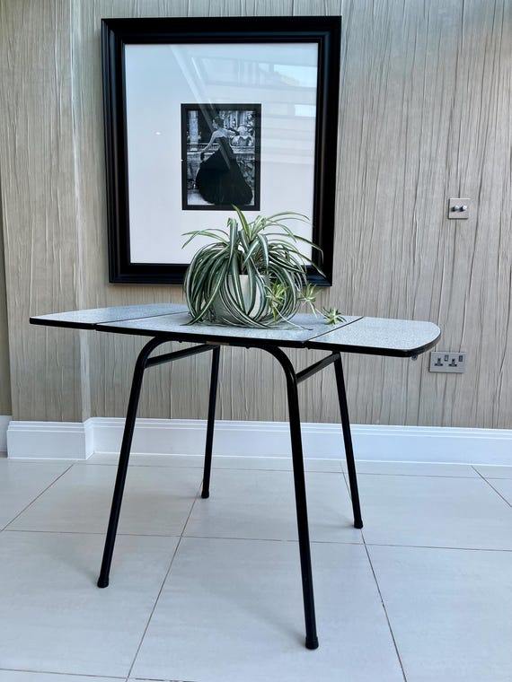 1950s Atomic Black and White Formica Drop Leaf Dining Table with Metal Frame